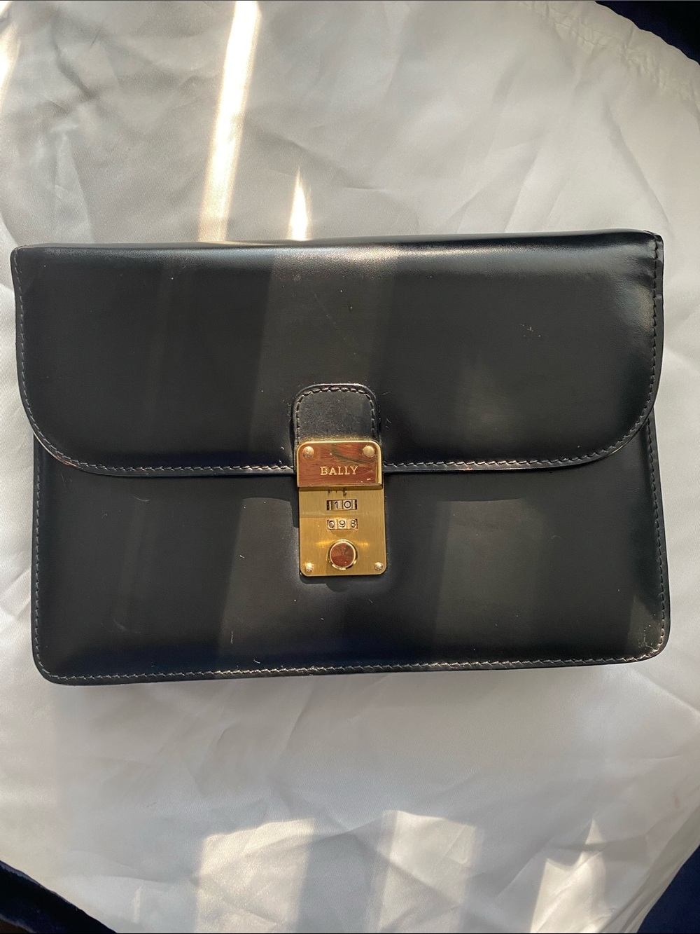 Bally Vintage Black Leather Clutch with Gold Lock and hidden strap
